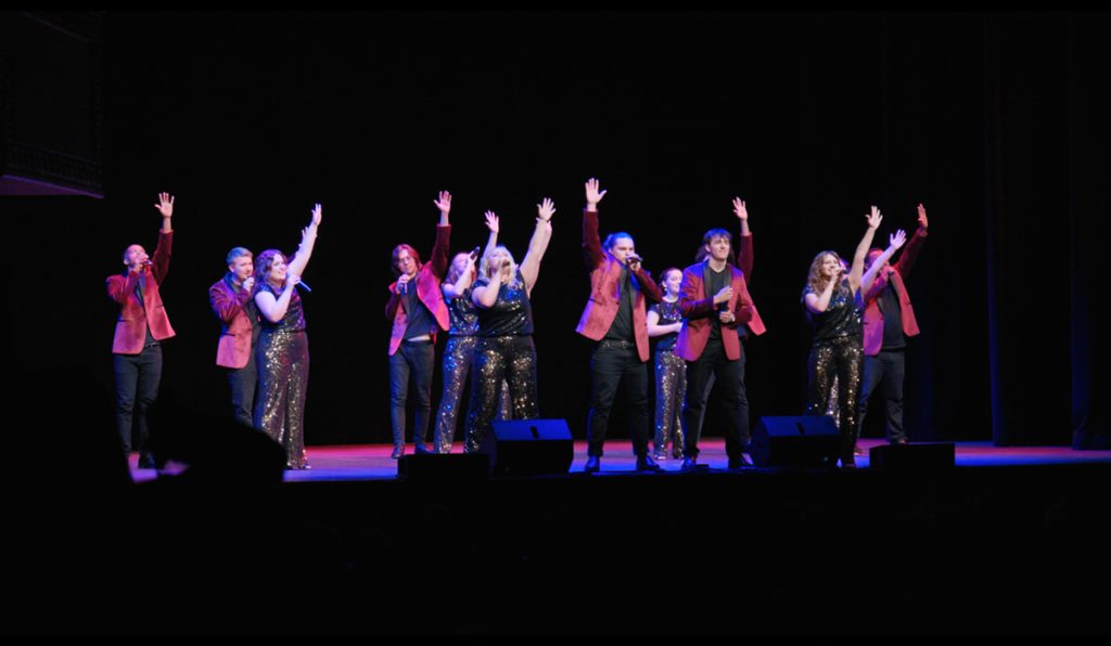 UMO's voice ensemble performing on stage